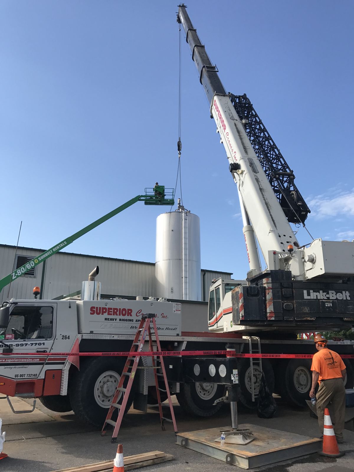 Stainless tank set by crane
